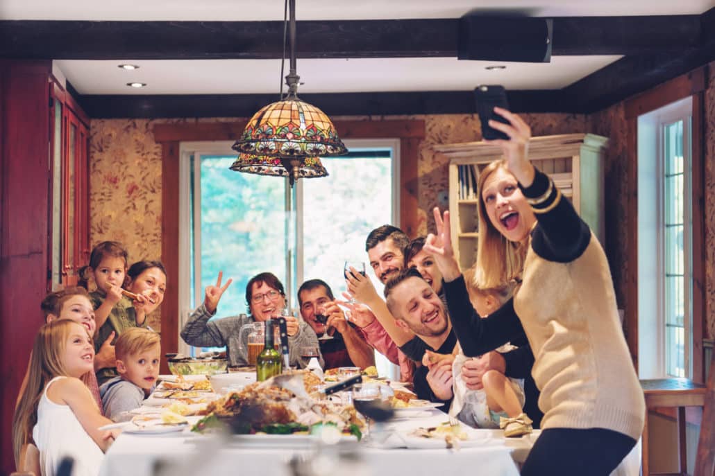 Family with foster children have considered how it benefits the entire family. Family at dinner table